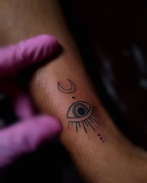 Tatuagem de olho grego: 60 ideias repletas de。